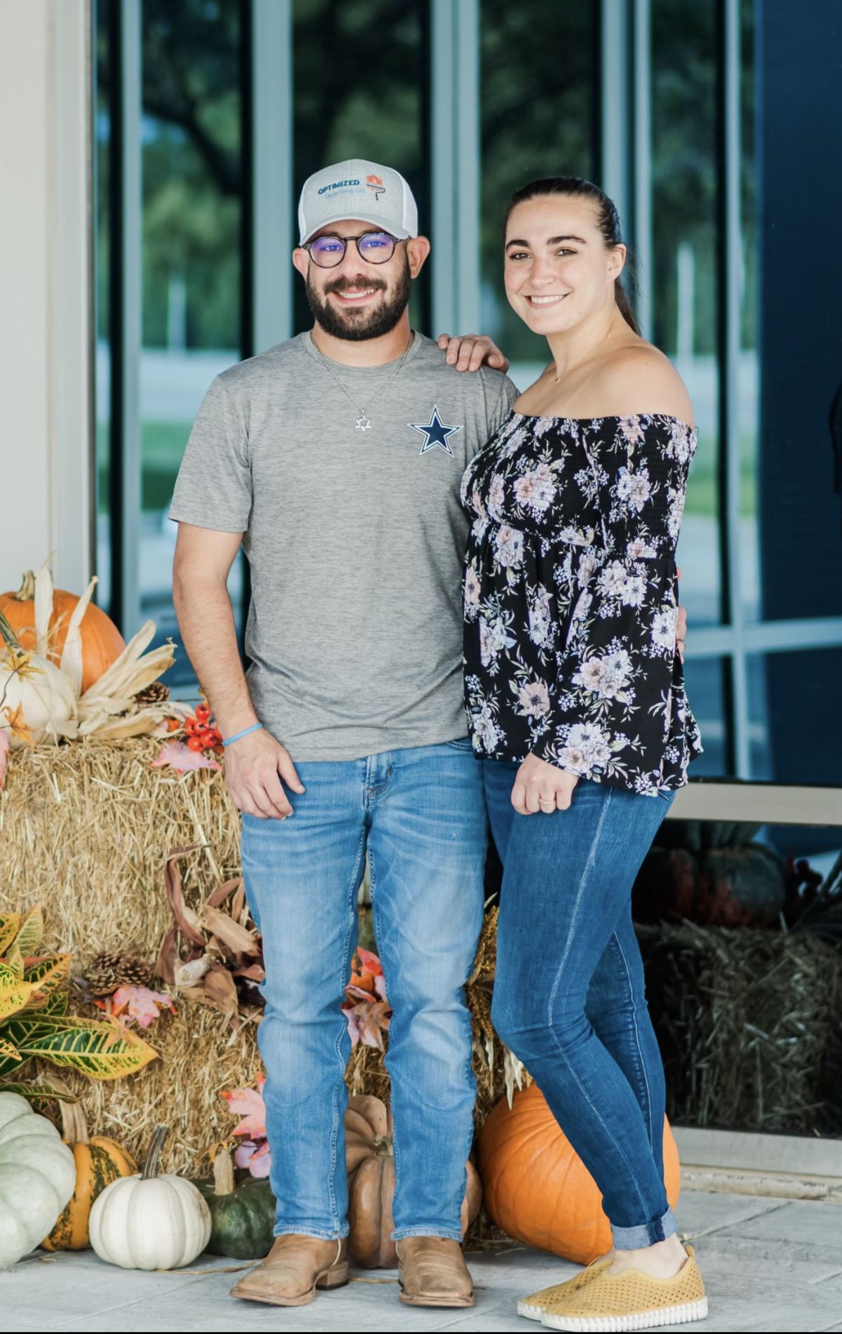 Cameron Markey, owner of Optimized Painting Co., with his family